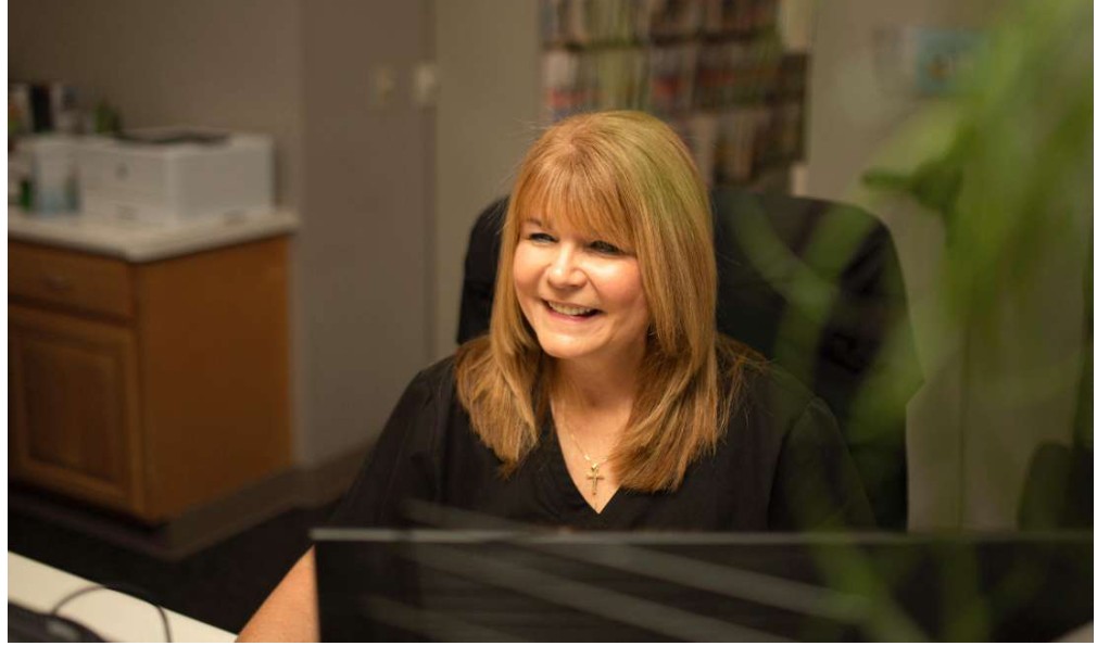 Office manager discussing financing